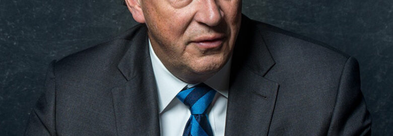 Robert (Bob) W. Cooper , KC